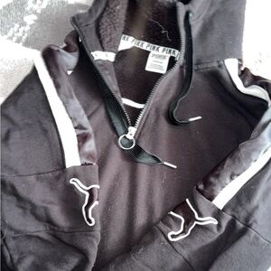VS pink black and white half zip.